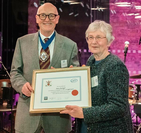 David presenting Diane Burleigh with her certificate for Honorary Fellowship